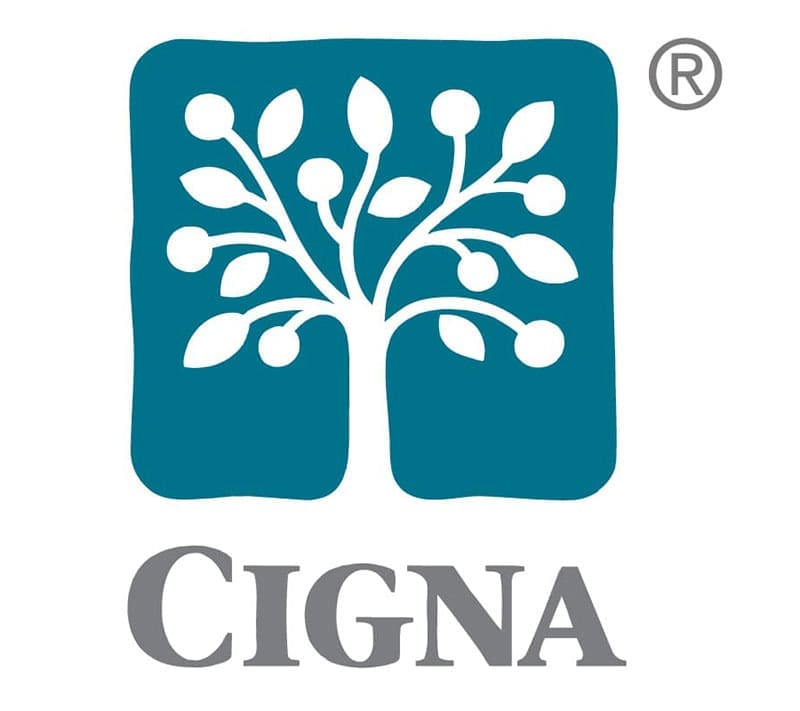 The Cigna logo featuring a white tree with circular nodes inside a teal rounded square, with "Cigna" written in gray below.
